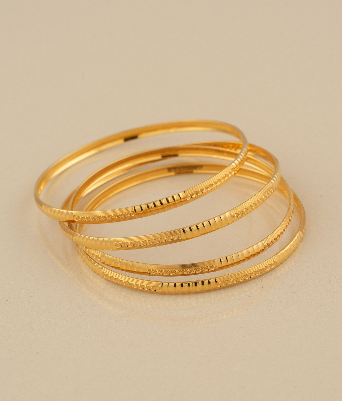 Delicate gold deals bangles design